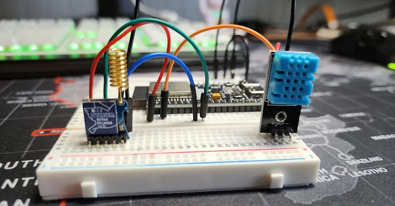 Arduino and LoRa components set up on a breadboard for a DIY project.
