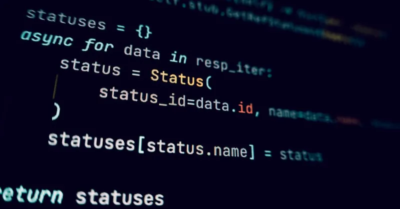 Detailed view of programming code in a dark theme on a computer screen.